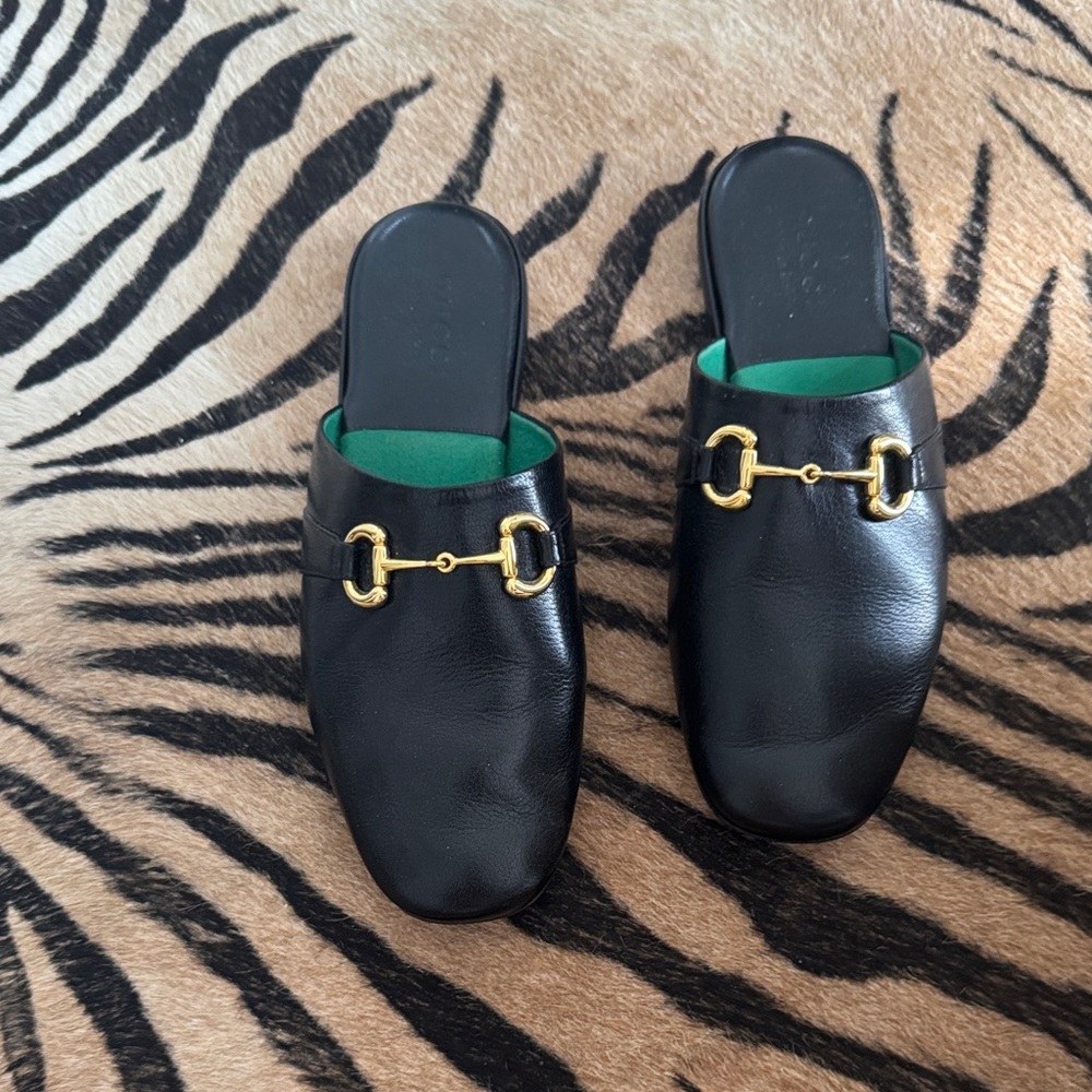 Gucci Black Leather Slip-Ons with Gold Hardware